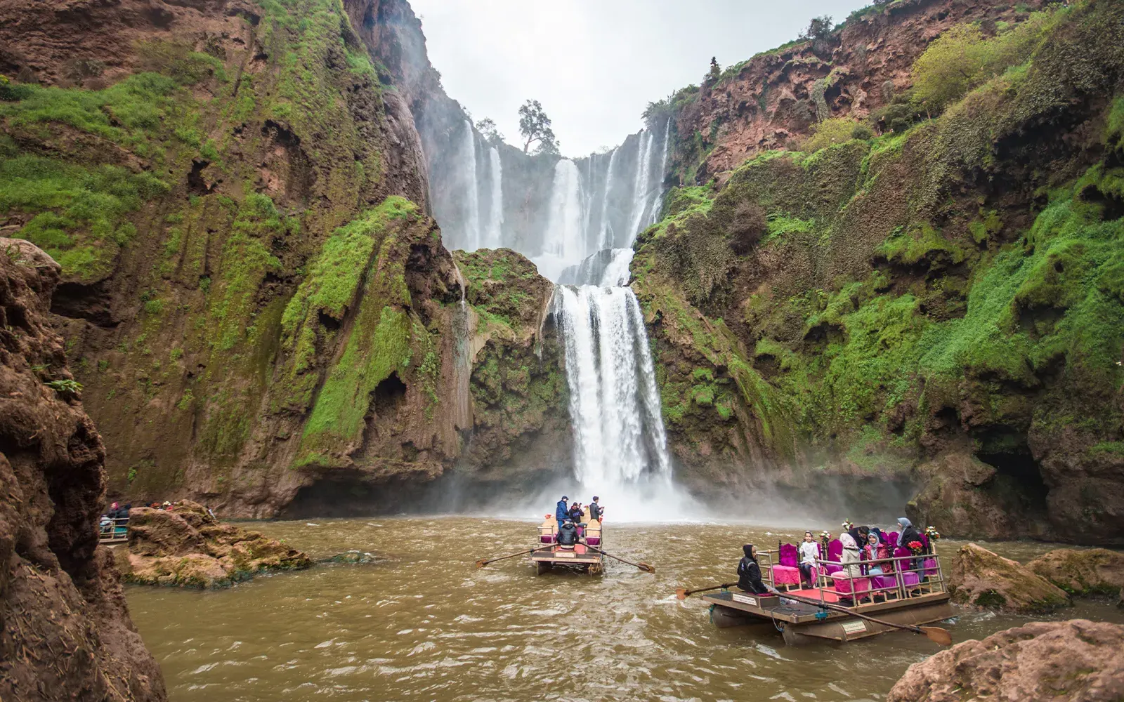 Ouzoud Waterfalls with rafts on the pool below